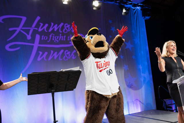 TC Bear on stage at Humor to Fight the Tumor Event